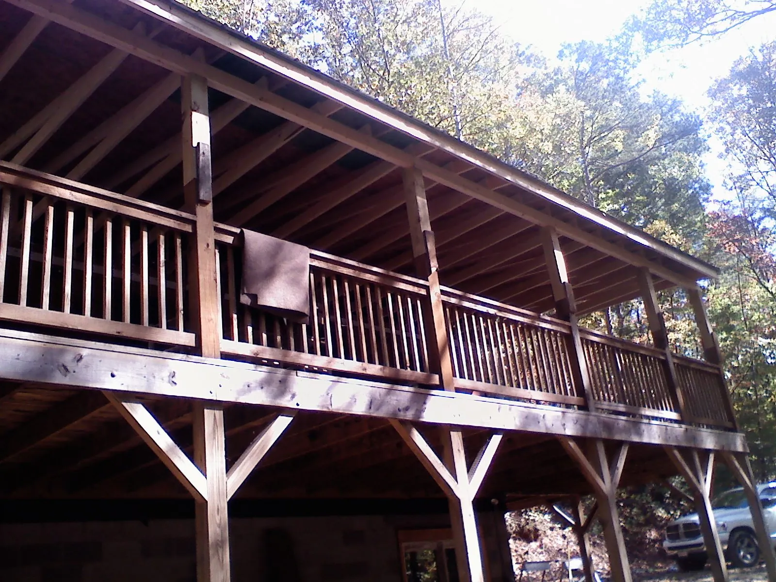 Timber framing under a new elevated porch and deck — Roof Leak Repair in Mentor by Roofing Brothers